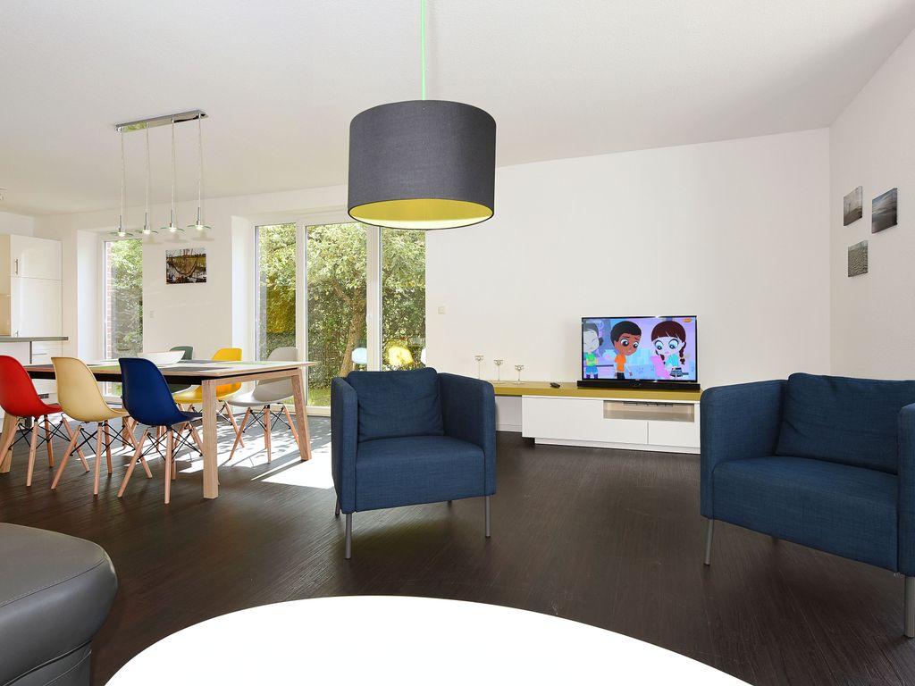 Wohnzimmer mit integriertem Küchenbereich