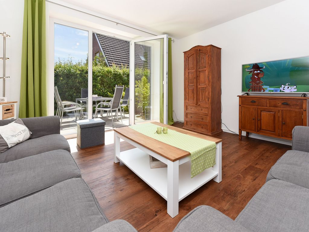 Wohnzimmer mit integriertem Küchenbereich