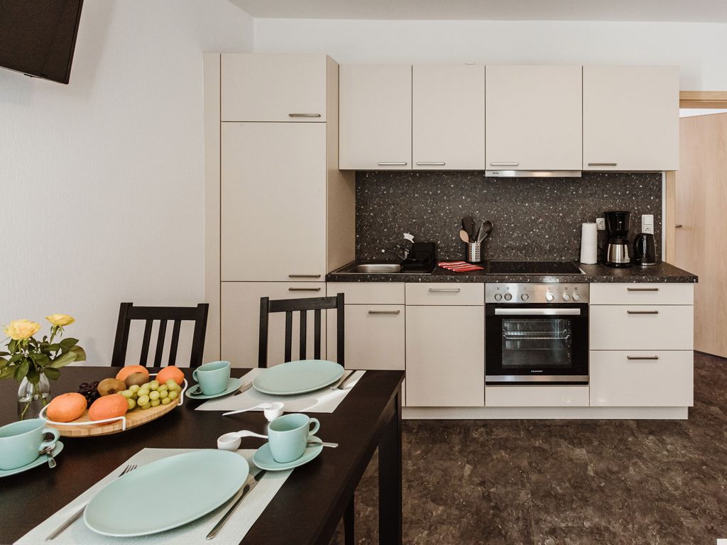 Ferienwohnung 3 - Wohnzimmer mit offener Küche