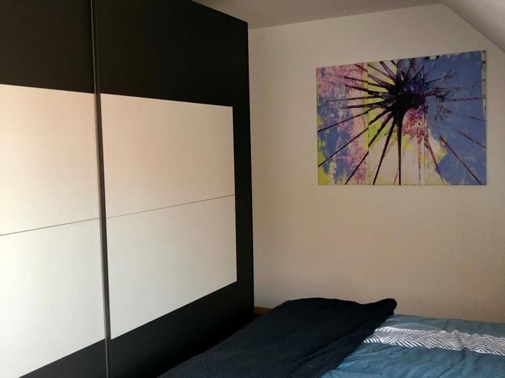 Schlafzimmer 2, mit großen Doppelbett und großen Kleiderschrank