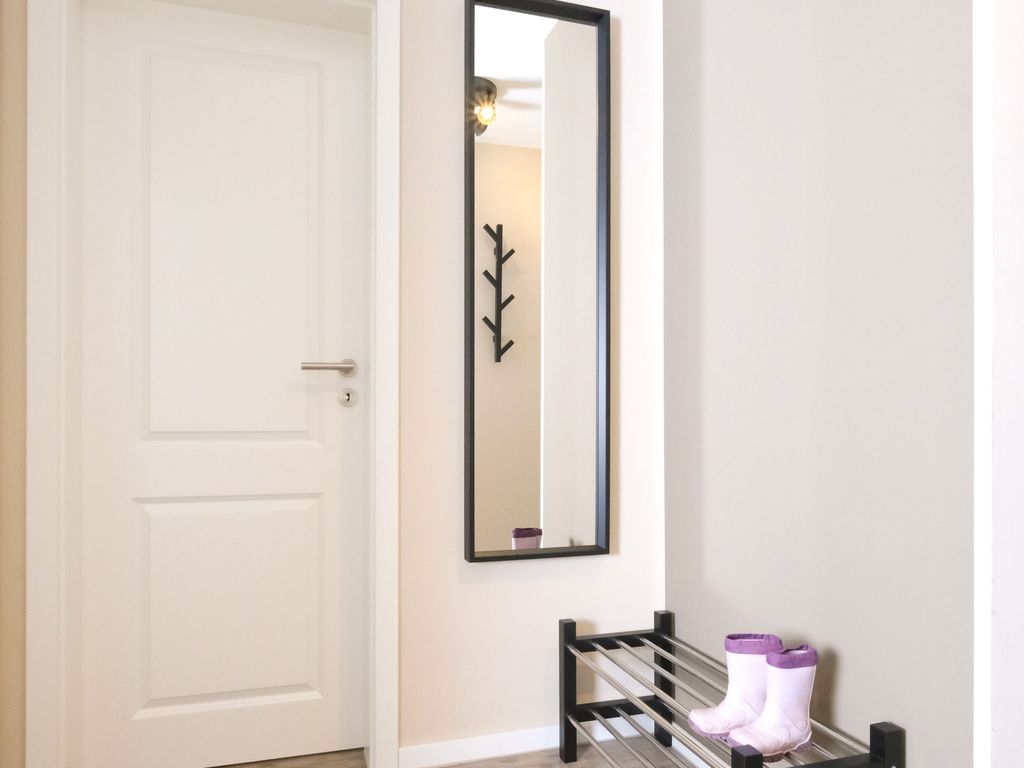 Modern und freundlich - der Flur mit Garderobe