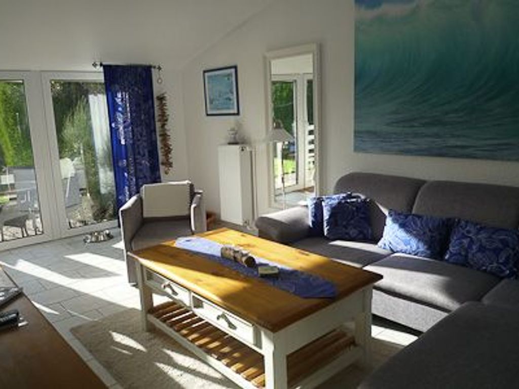 Wohnzimmer mit integriertem Küchenbereich