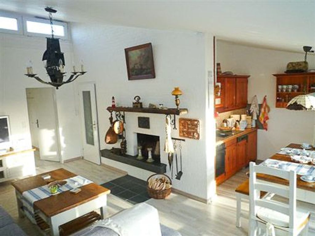 Living room with integrated kitchen area