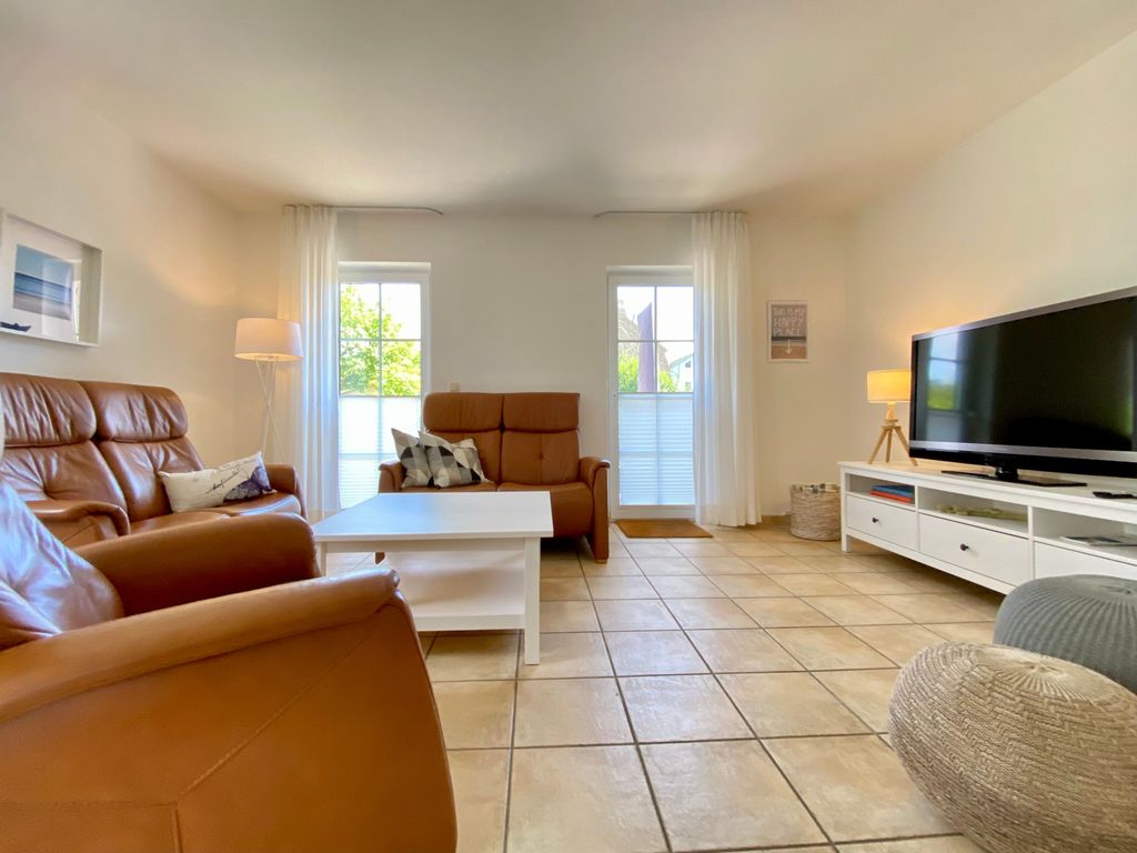Ferienhaus Ostseekind in Karlshagen, Sitzecke mit TV