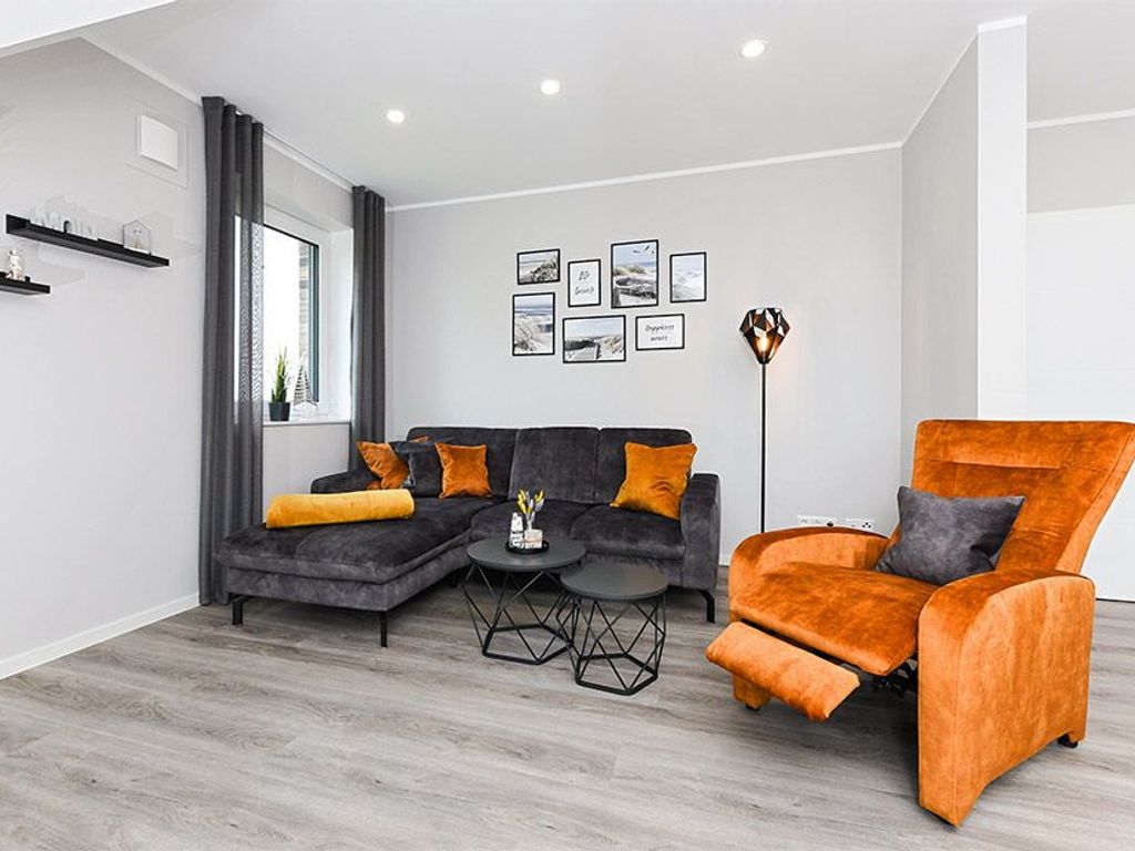 Wohnzimmer mit integriertem Küchenbereich