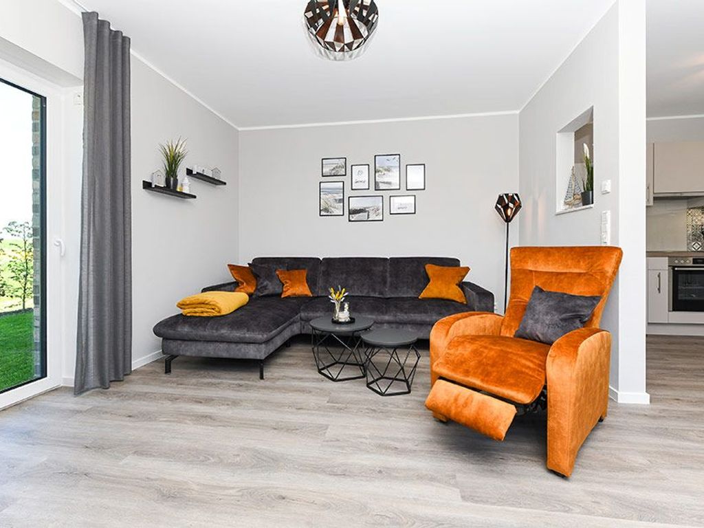 Wohnzimmer mit integriertem Küchenbereich