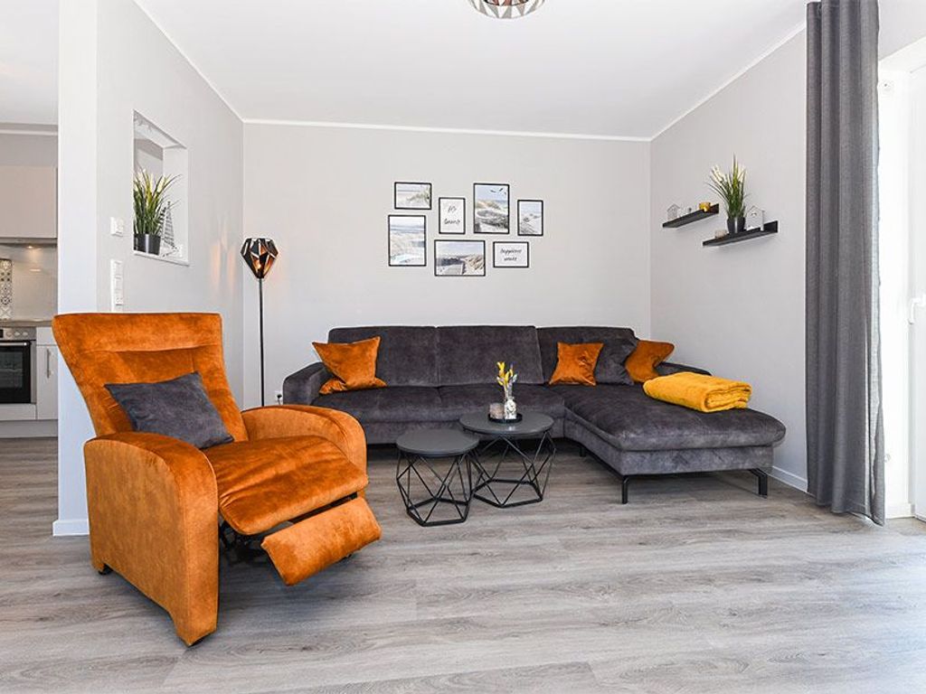 Wohnzimmer mit integriertem Küchenbereich