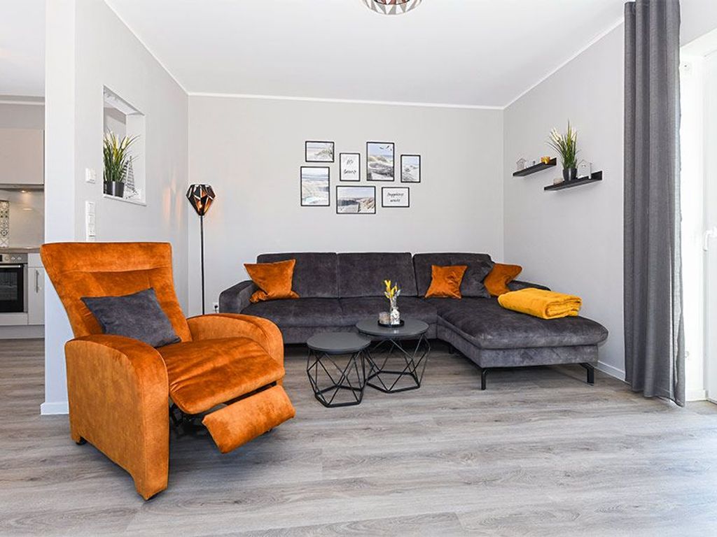 Wohnzimmer mit integriertem Küchenbereich