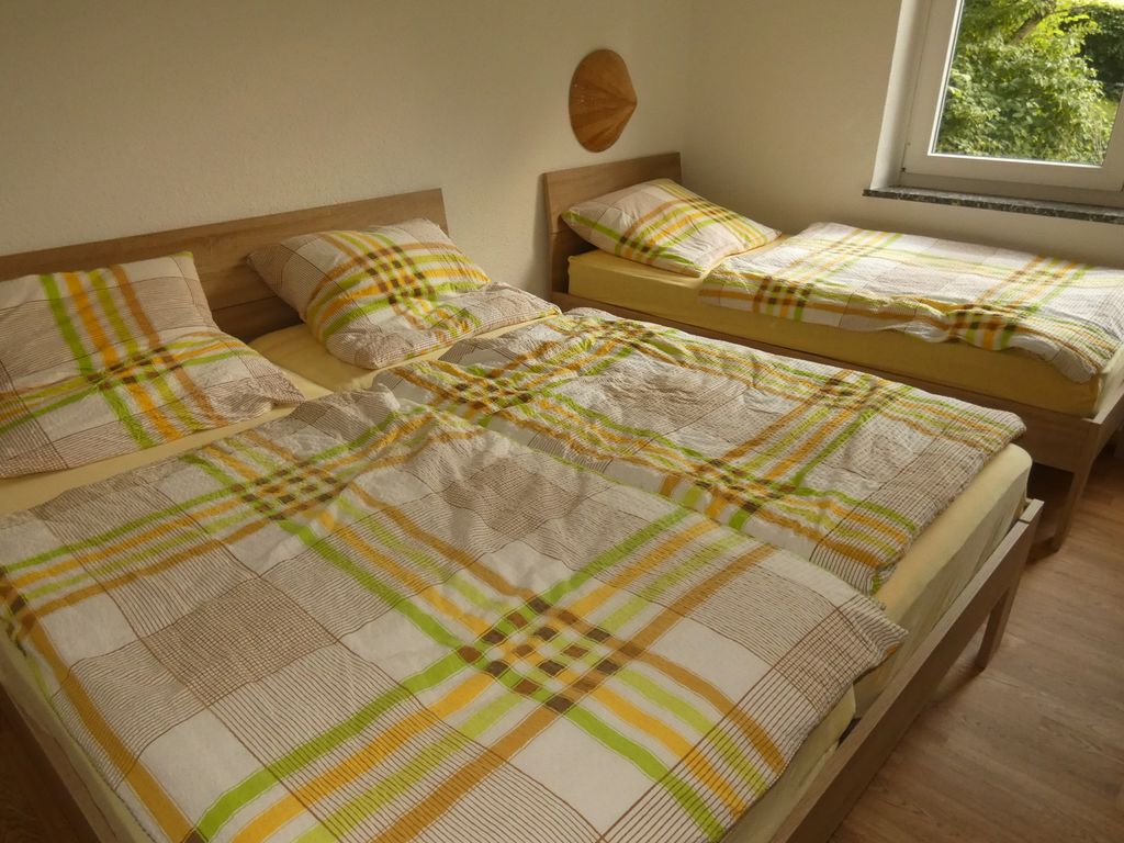 Schlafzimmer mit 3 Betten