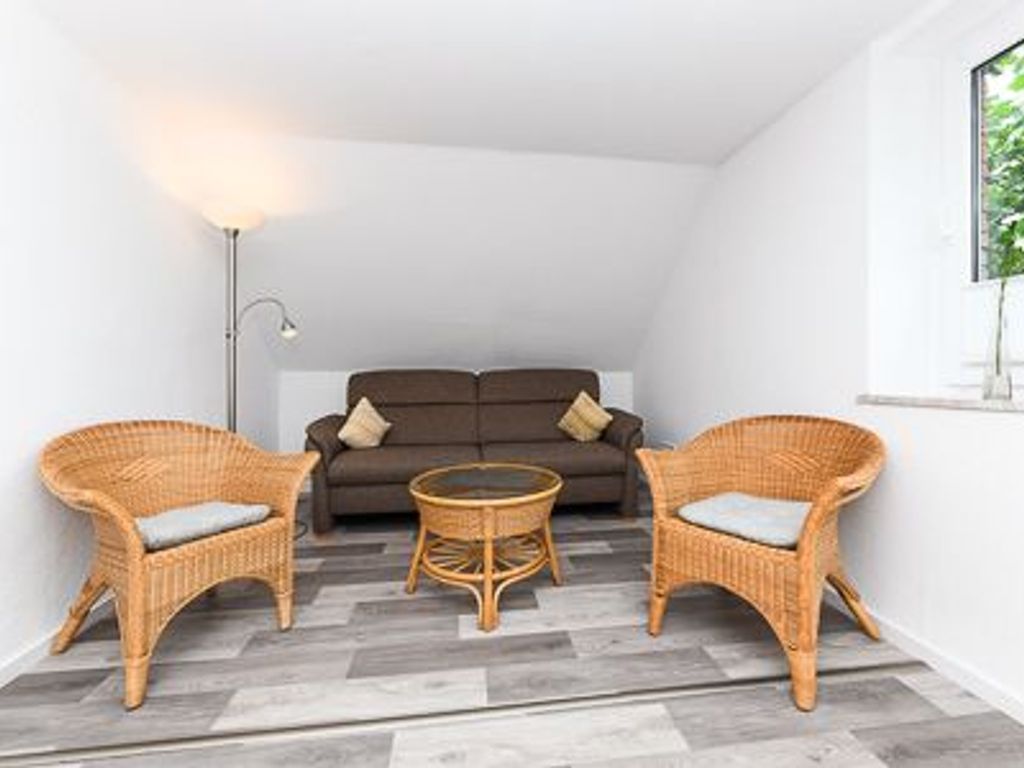Wohnzimmer mit integriertem Küchenbereich