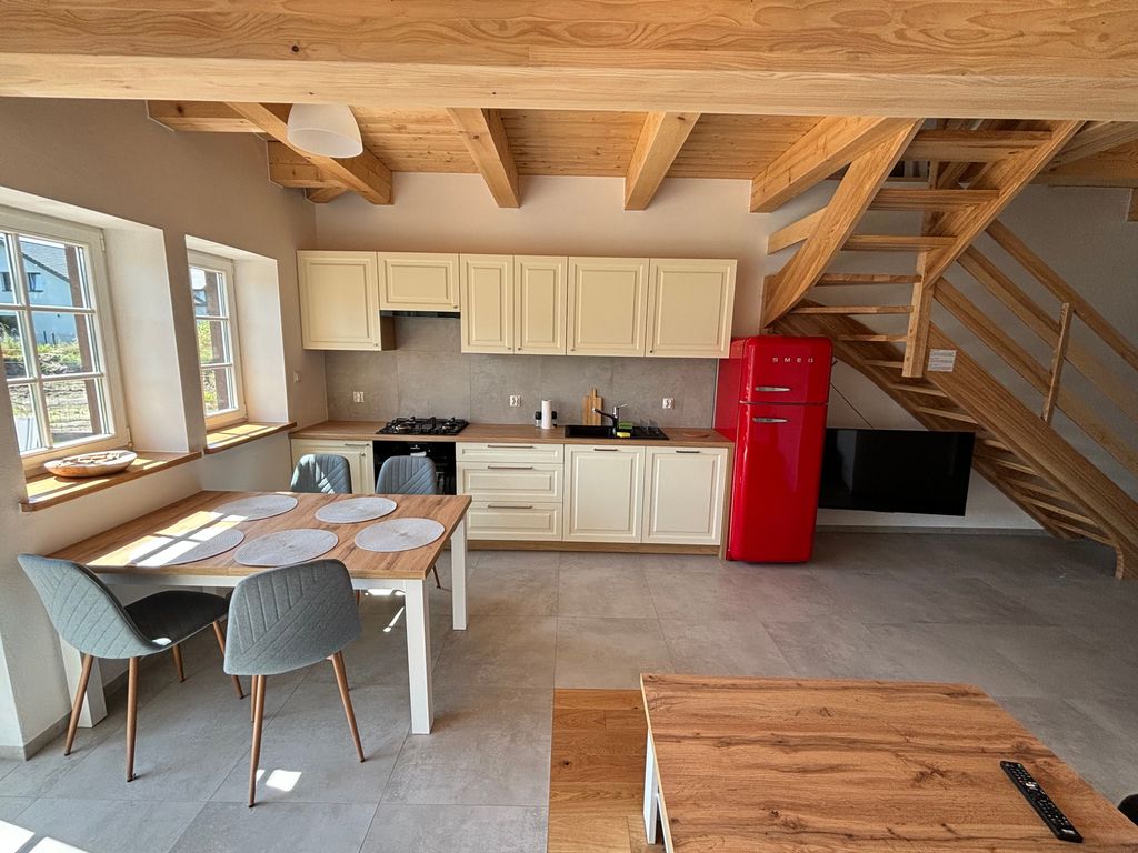 Wohnzimmer mit Küche