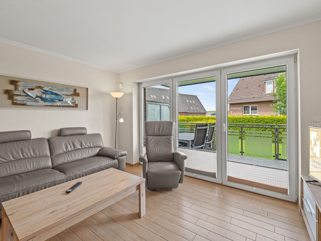 Wohnzimmer mit Balkon