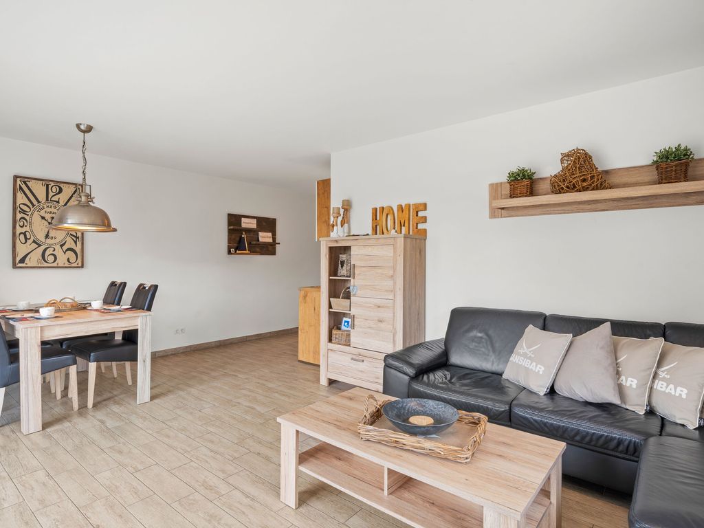 Wohnzimmer mit integriertem Essbereich