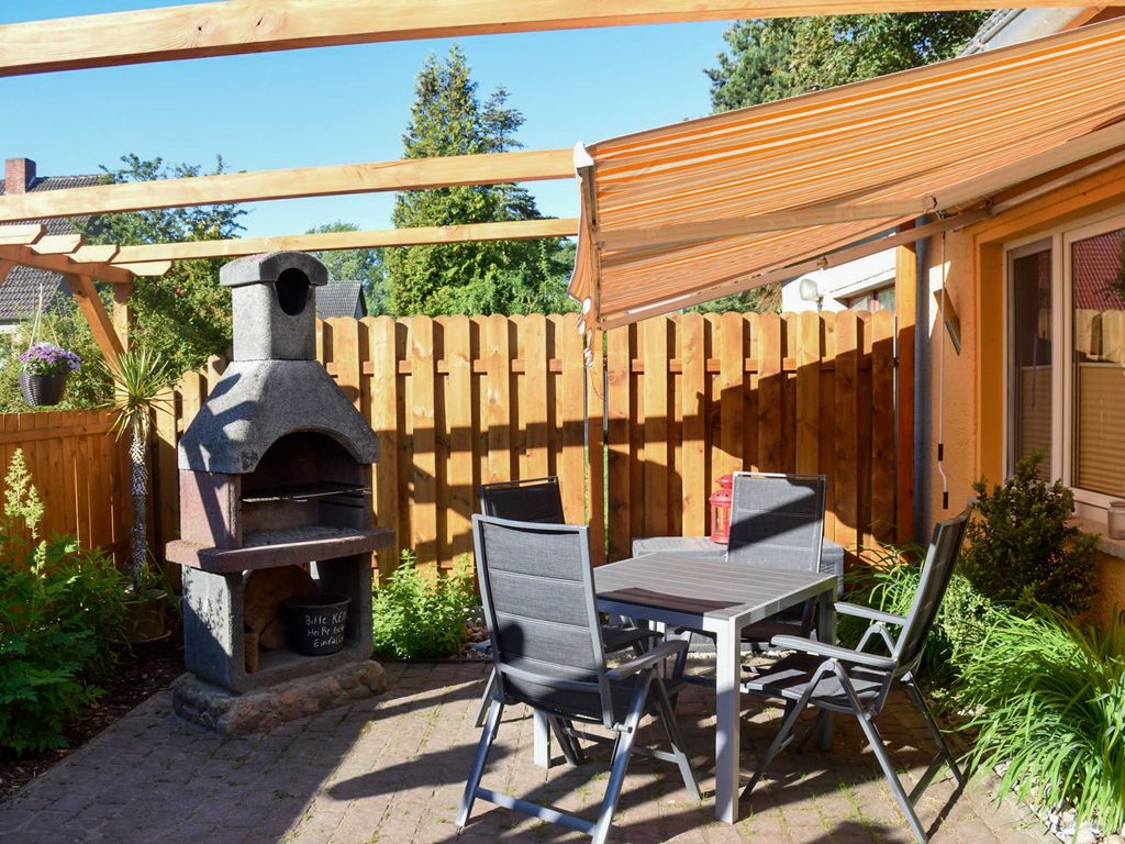 Terrasse mit Grill und Sitzecke