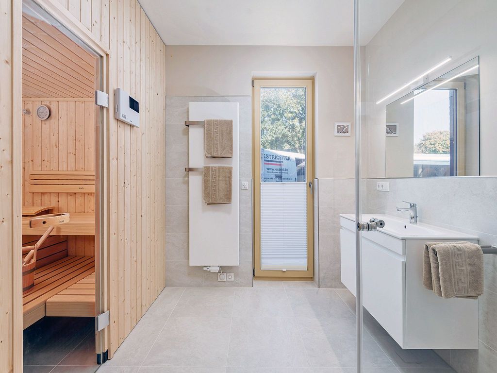 Integral Immobilien: Dein Darß Urlaub Born - Duschbad mit Sauna in der Ferienwohnung To Huus