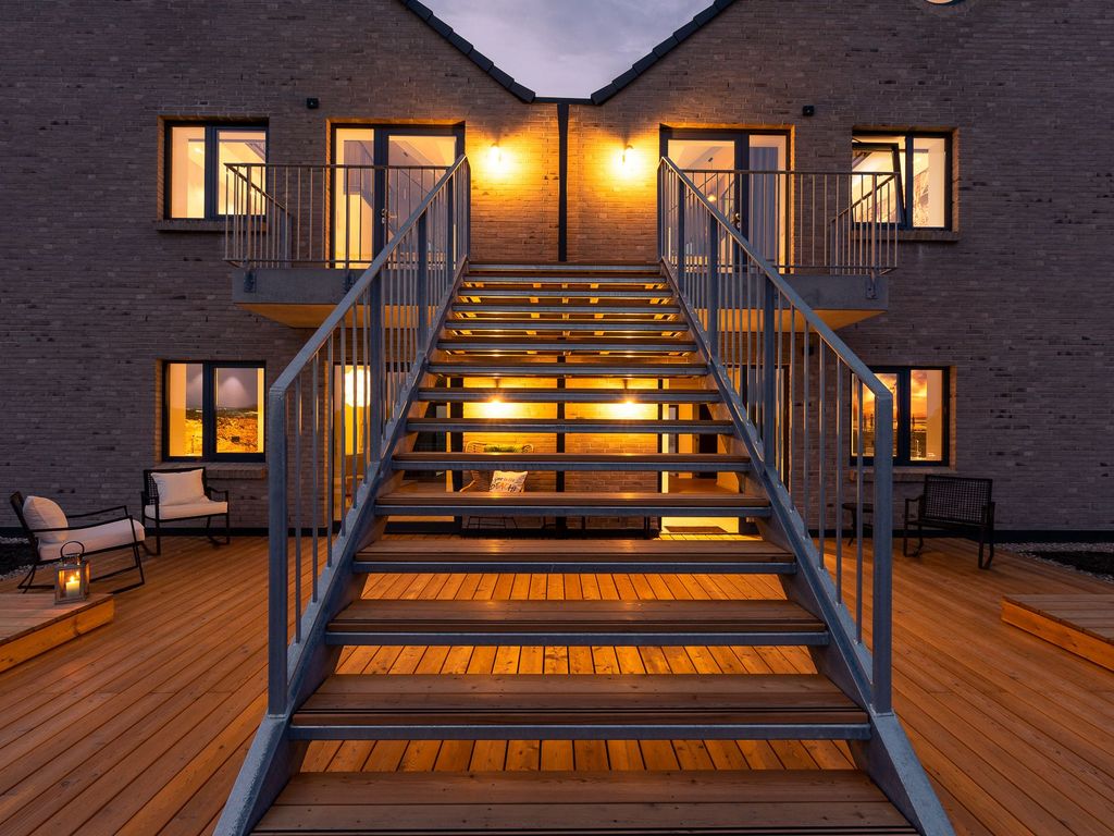 Aufgang zu den Rooftop Garden Apartments 5 -7 im Ostseertesort Olpenitz.