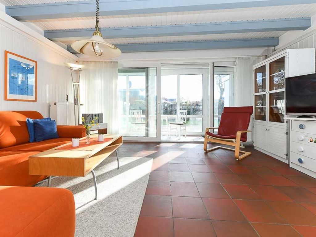 Wohnzimmer mit integriertem Küchenbereich
