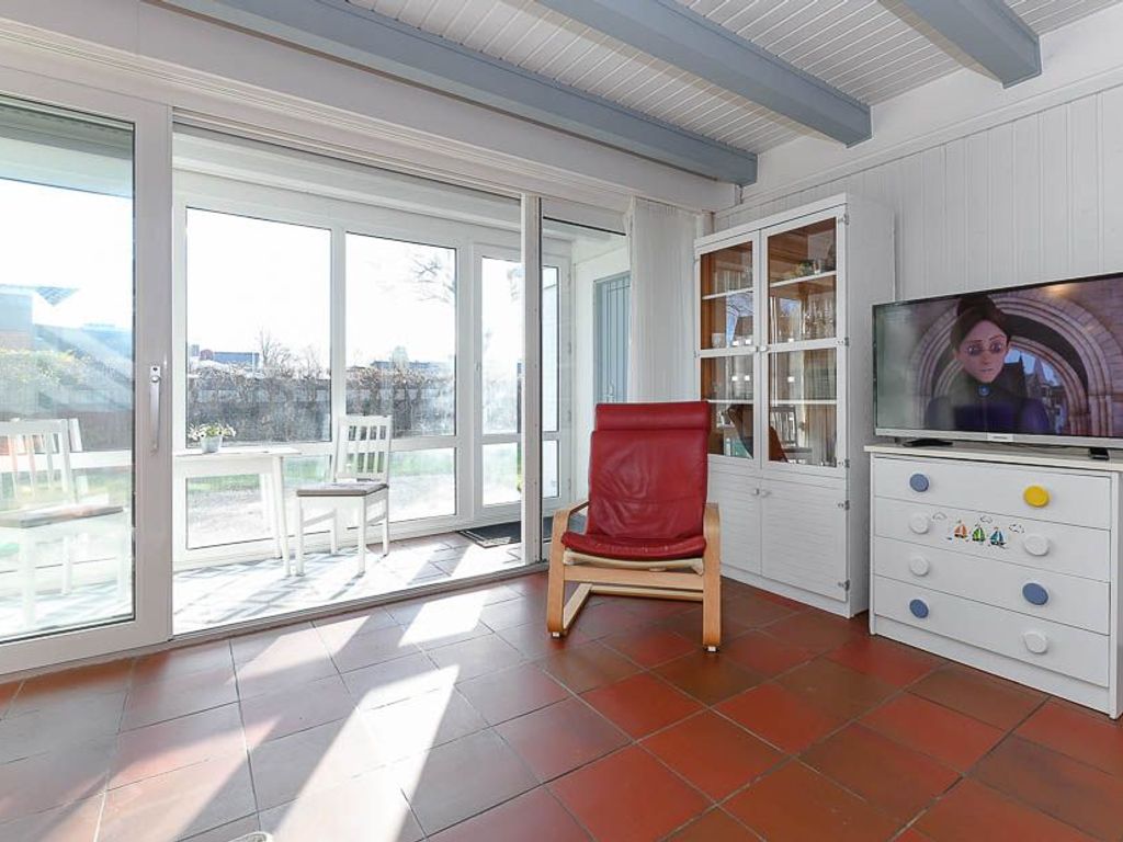Wohnzimmer mit integriertem Küchenbereich