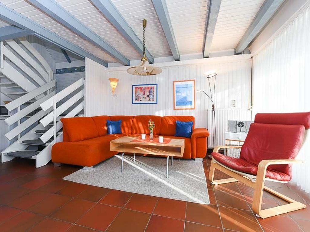 Wohnzimmer mit integriertem Küchenbereich