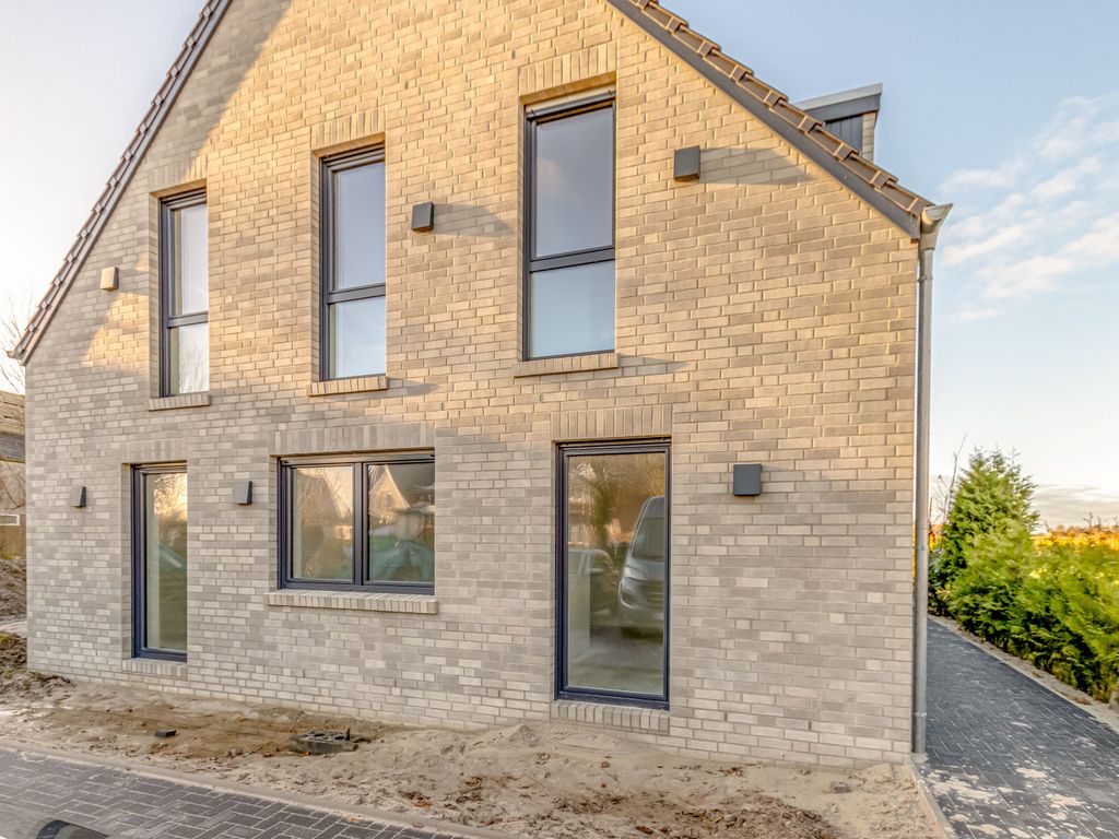 Ruhig gelegenes und ultra modernes Appartmenthaus in Bensersiel, nur wenige Minuten zu Fuß vom Strand entfernt und mit Blick auf ein wunderschönes Naturgebiet
