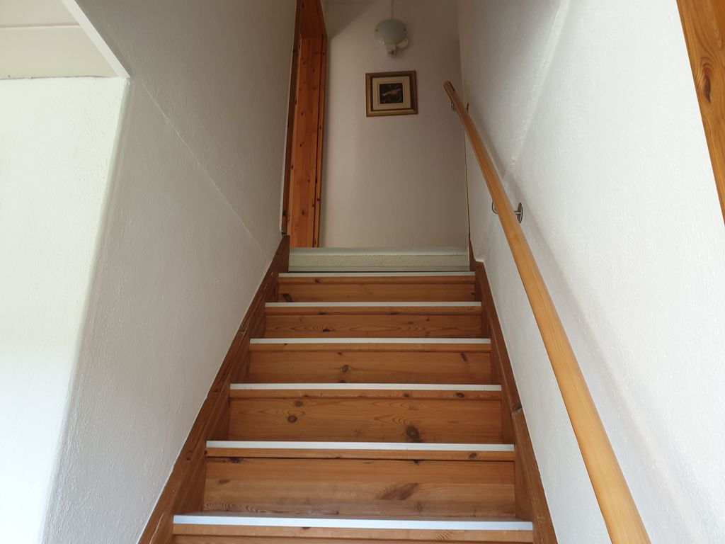 Treppe in das Obergeschoss