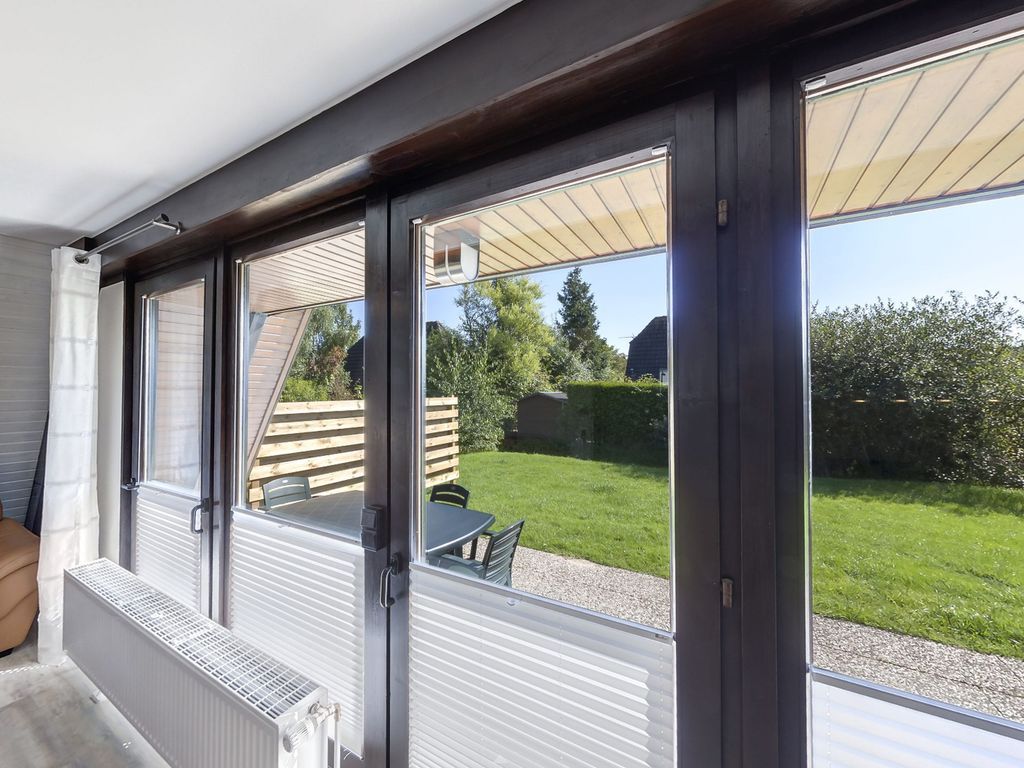 Blick vom Wohnraum auf die Terrasse (Modell M20)