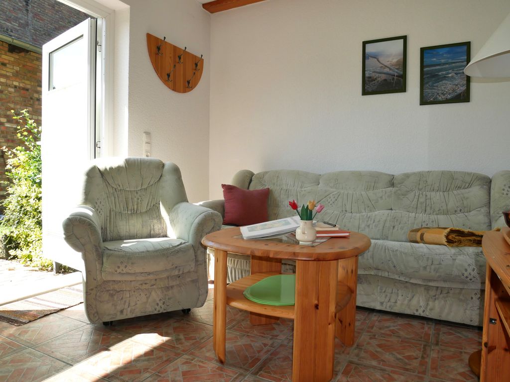 Wohnzimmer mit offener Küche