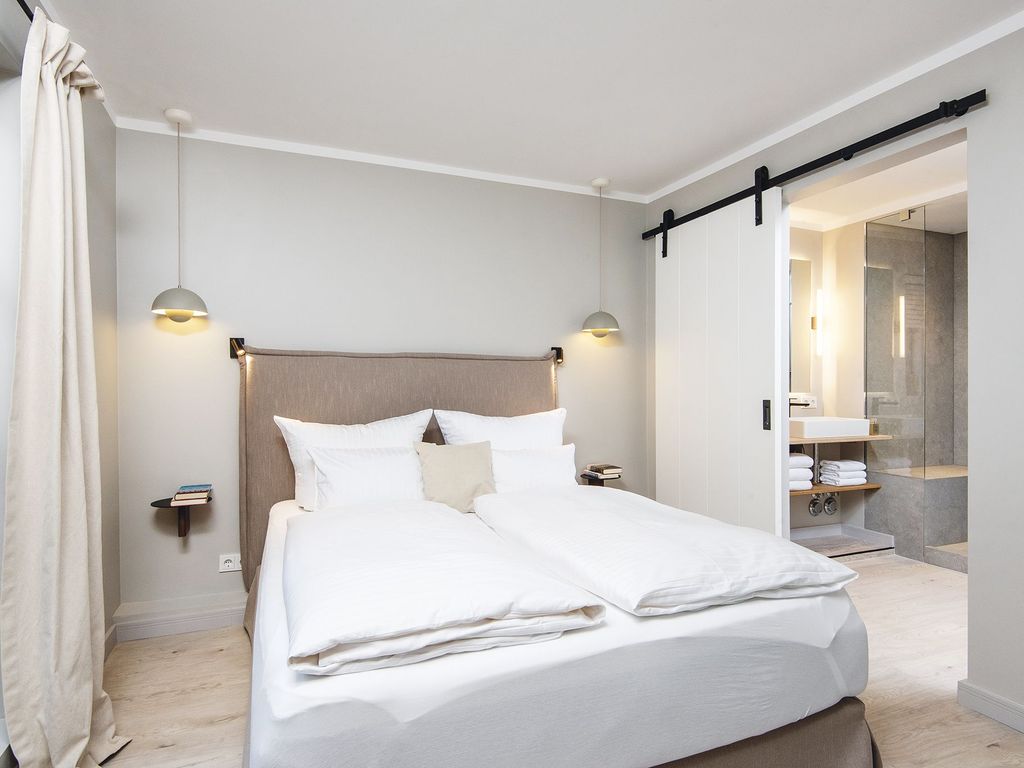 Doppelschlafzimmer mit Bad en suite im Souterrain