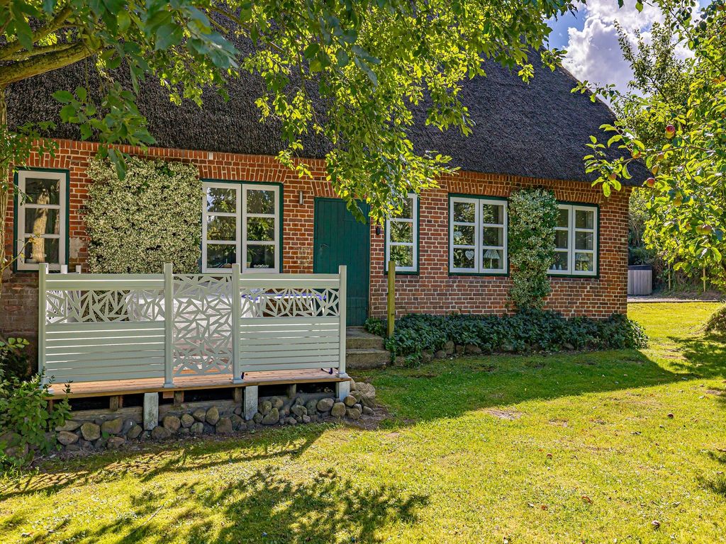 Terrasse auf der Rückseite des Hauses