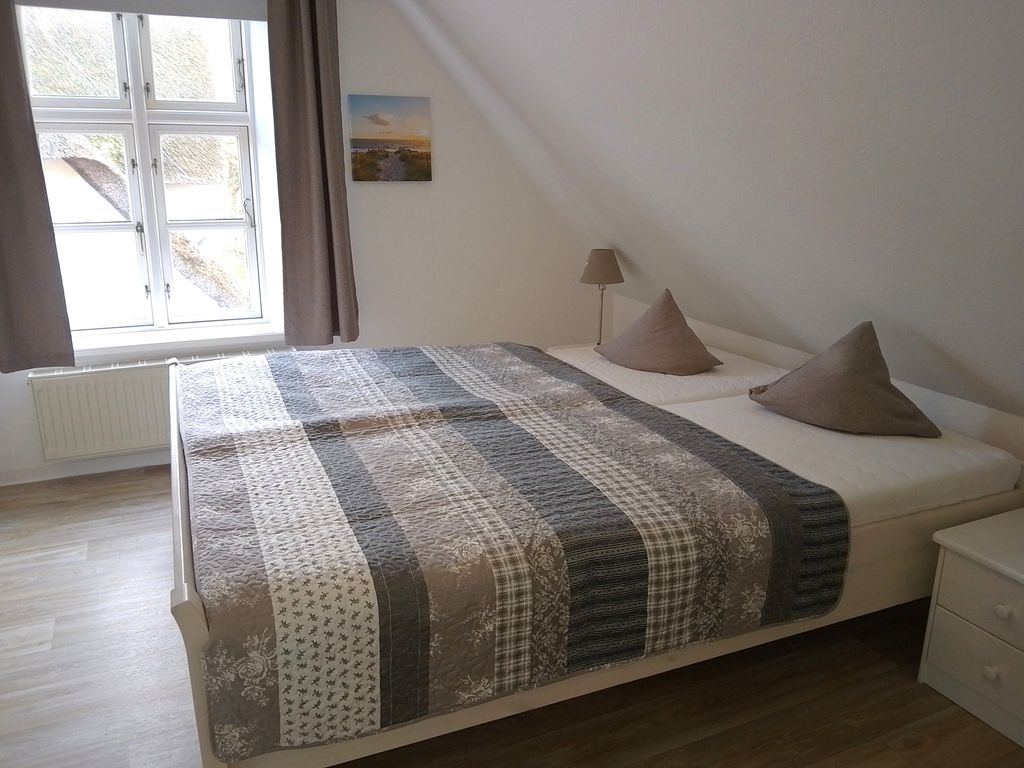 Schlafzimmer mit Doppelbett