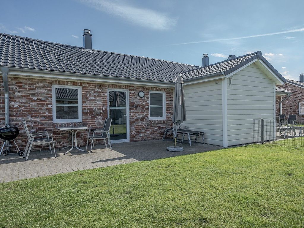 Ferienhaus Chaplin mit Kamin und eingezäuntem Garten