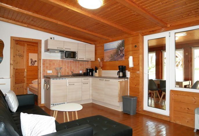 Photo Ferienhaus Ostsee- Strandkoerbchen- Waldblick 1