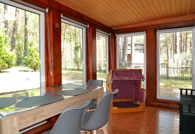 Photo Ferienhaus Ostsee- Strandkoerbchen- Waldblick 2