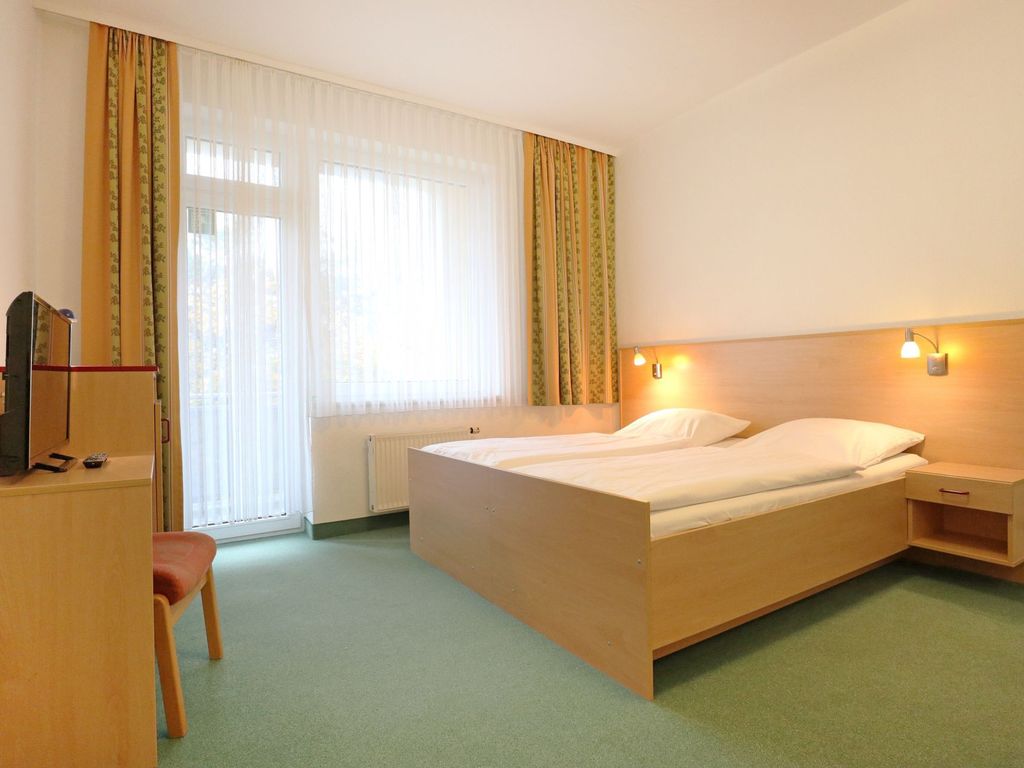 Strandflieder Zimmer 206 - Blick auf den offenen Schlaf-/ Wohnbereich