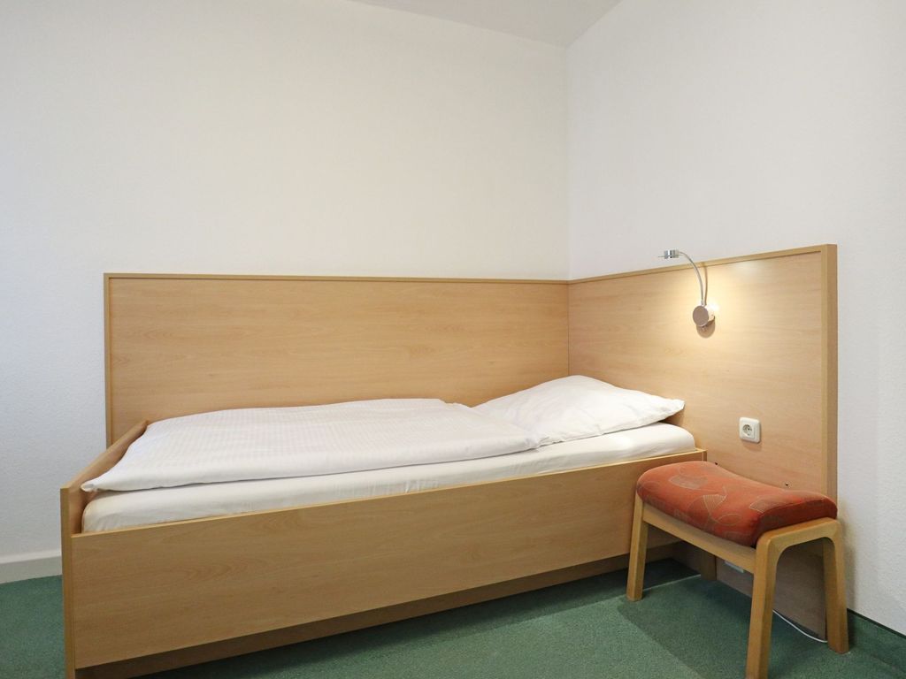 Strandflieder Zimmer 304 - Blick auf den Schlafbereich
