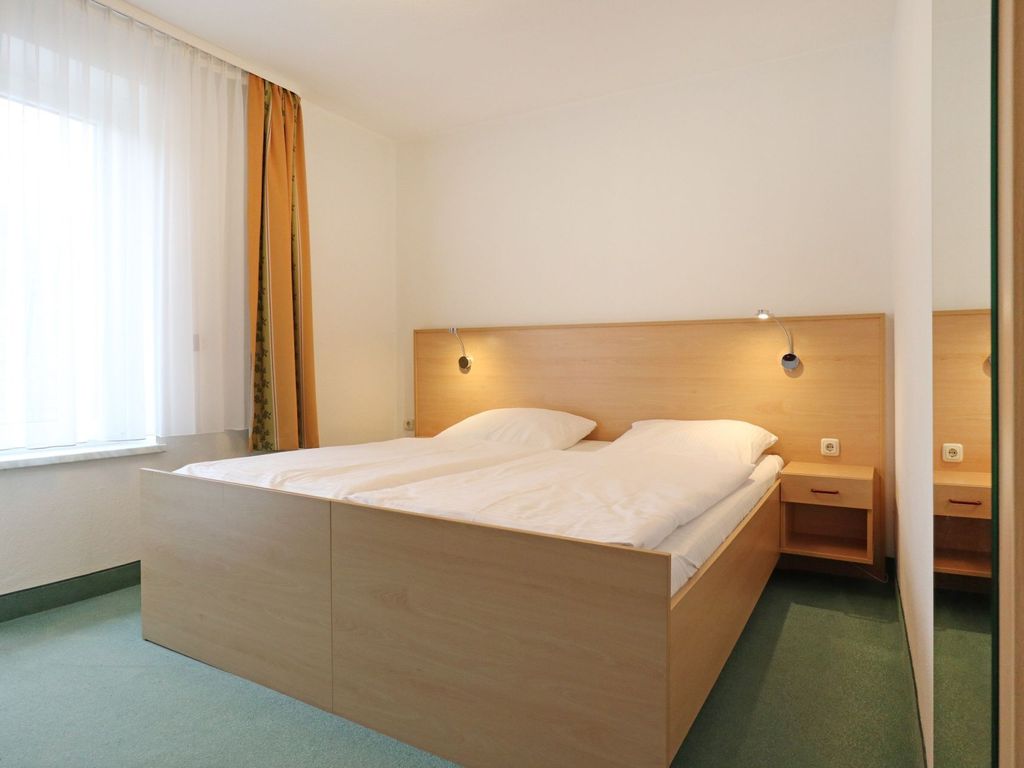Strandflieder Zimmer 307 - Blick auf den offenen Wohn-/ Schlafbereich