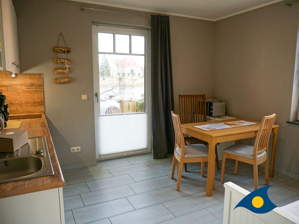 Wohnküche mit Zugang zur Terrasse