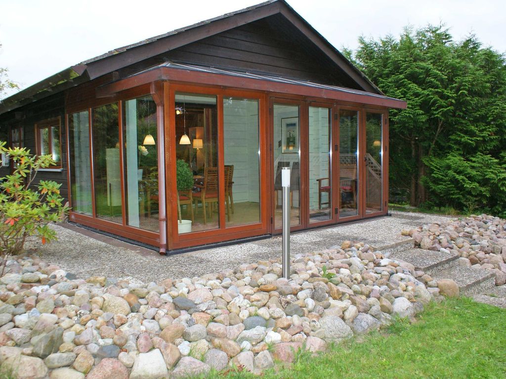 Blockhaus mit Wintergarten