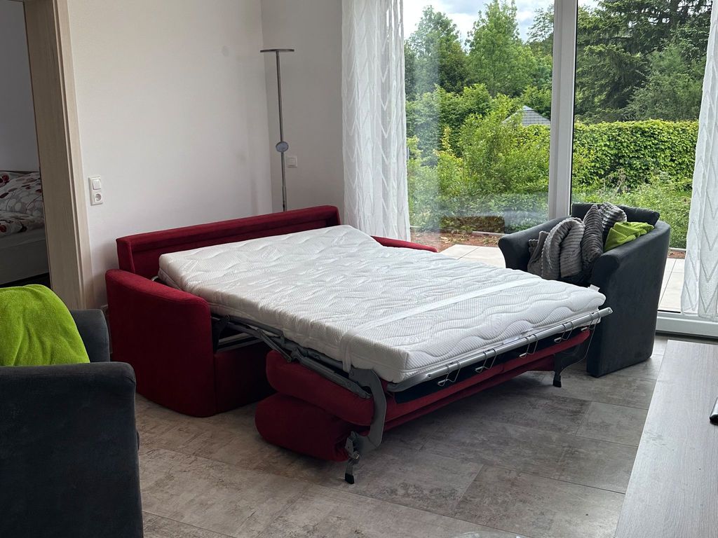 Wohnzimmer
Aufbettung