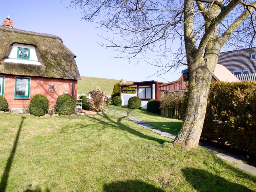 Friesischer Urlaub unter Reet und direkt am Meer!