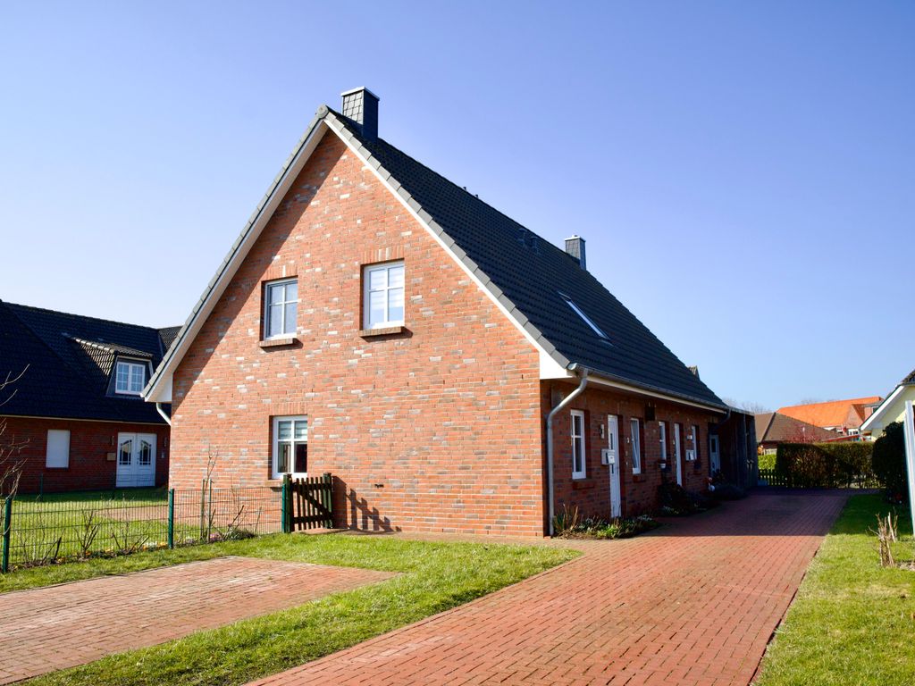 vollumzäunter grüner Garten