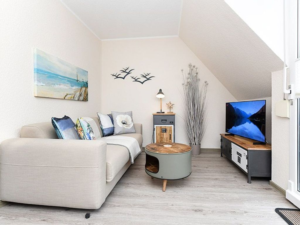 Wohnzimmer mit integriertem Küchenbereich