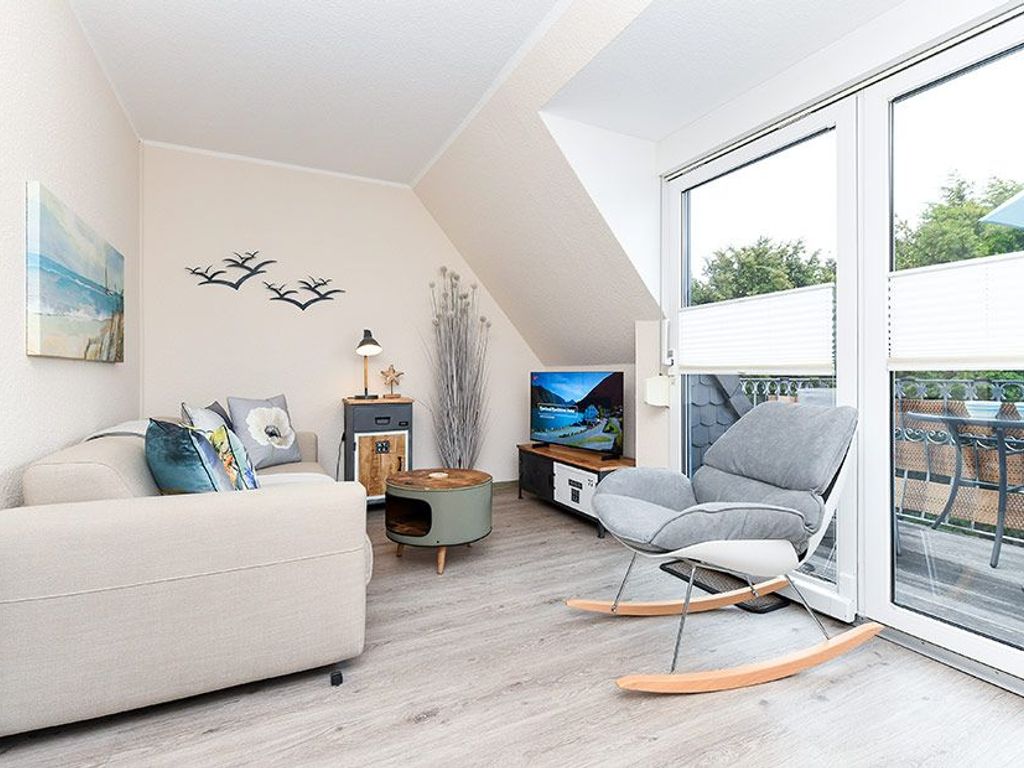Wohnzimmer mit integriertem Küchenbereich