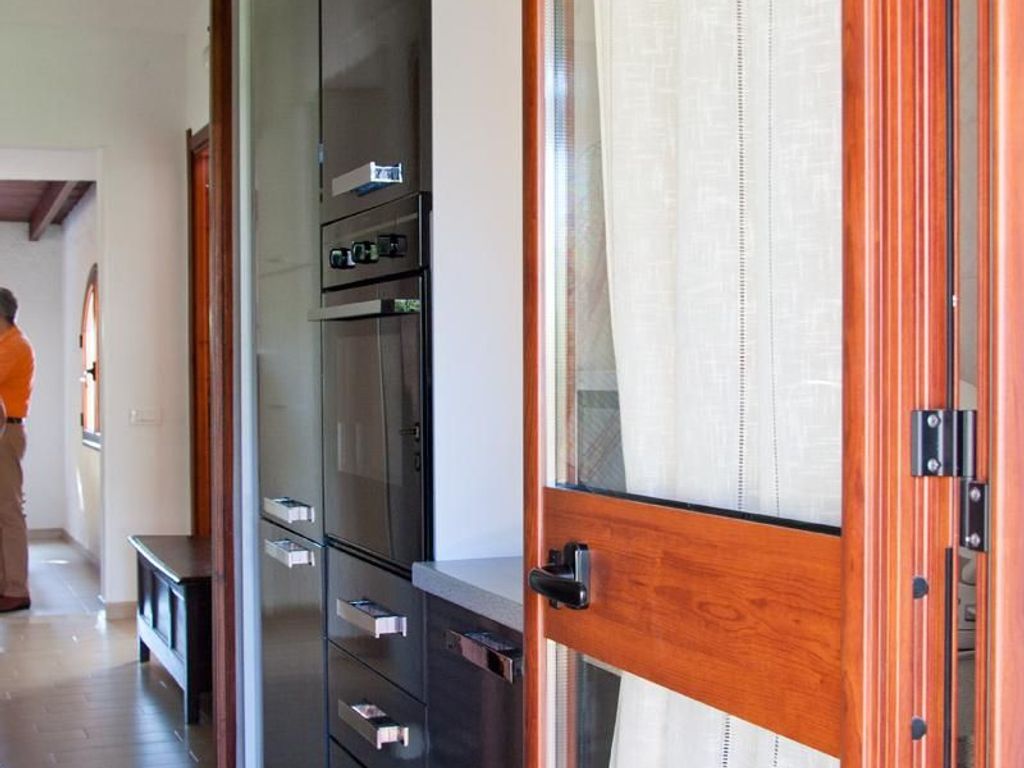Ferienhaus 105, Villetta Sabbia, Eingang Kueche
