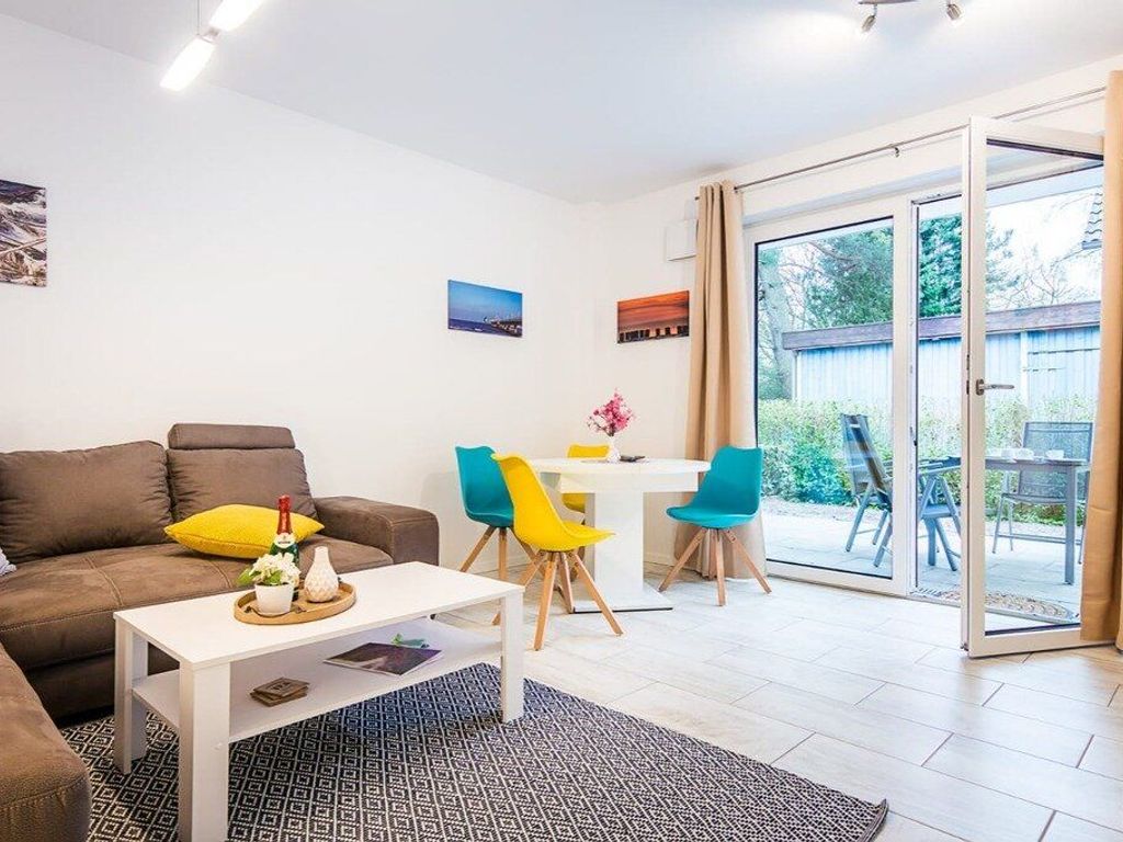 Ferienwohnung Ben Castella Usedom mit schönen Wohnbereich Blick auf die Terrasse