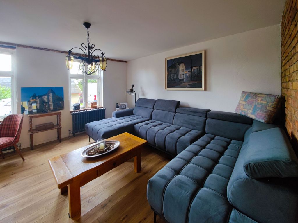 Wohnzimmer mit großer Wohnlandschaft