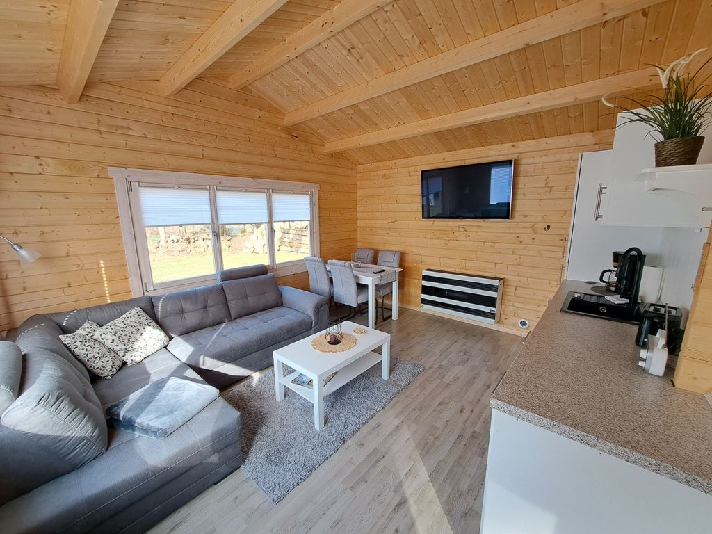 Wohnzimmer mit Küche