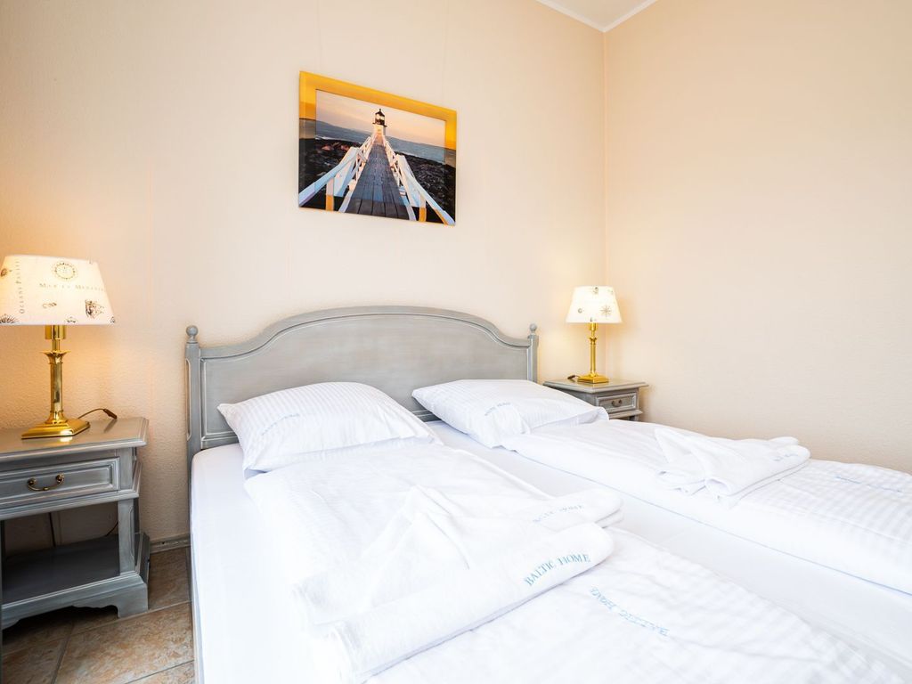Schlafzimmer mit Zugang zur Terrasse