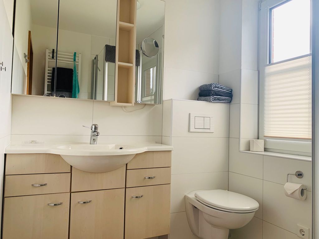 Badezimmer -Waschbecken/Toilette-