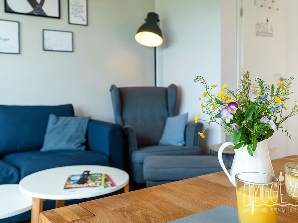 Wohnzimmer mit integriertem Küchenbereich